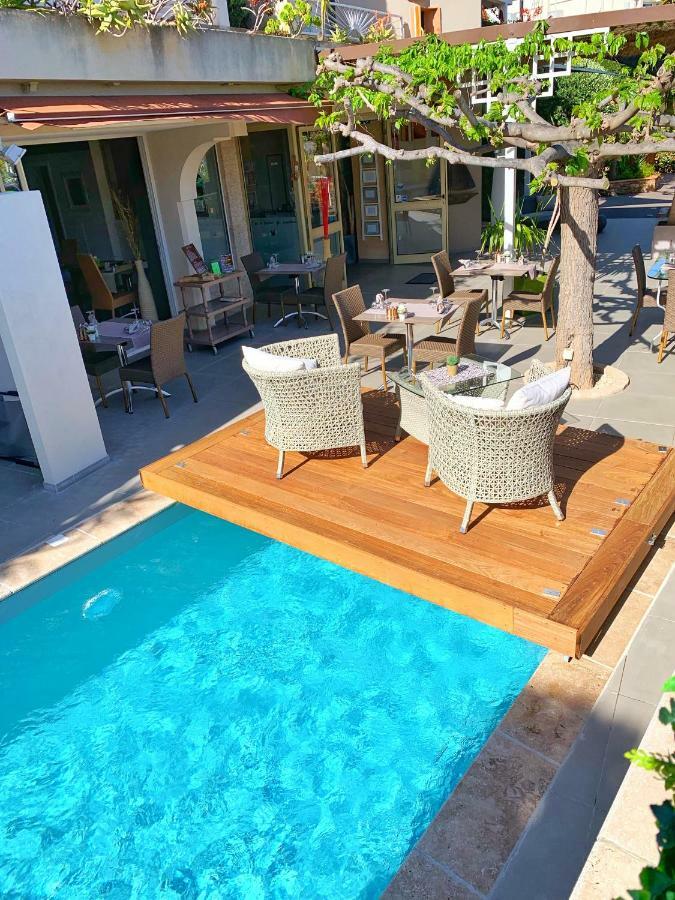 Hotel Beau Soleil Le Lavandou Bagian luar foto